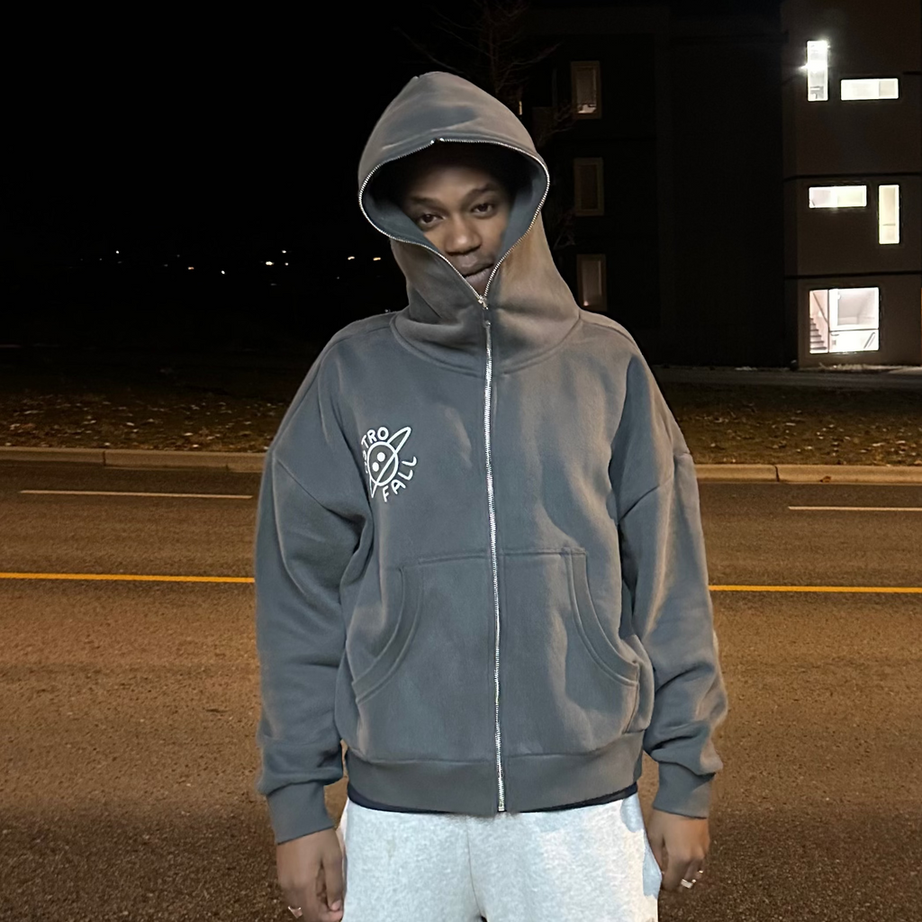 Travis Scott wearing the Astrofall full zipper